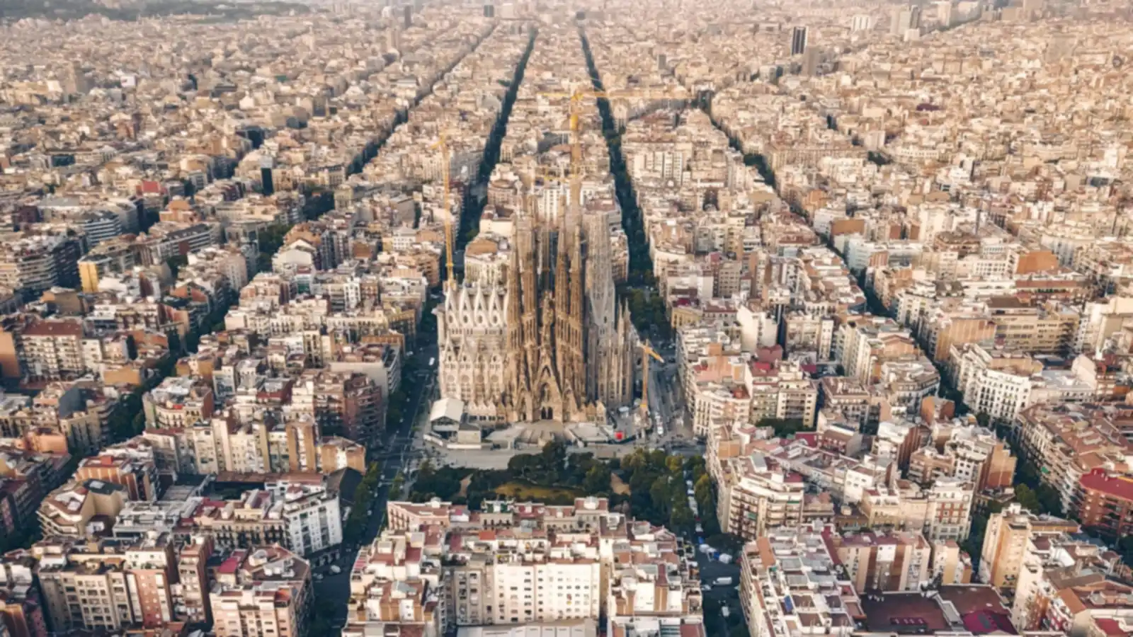 Aerial view of the Eixample grid and the Sagrada Família in Barcelona