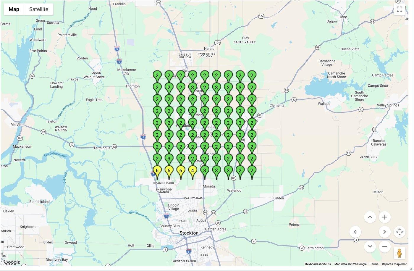 Geo grid ranking report two months after optimization, showing the same Google Business Profile ranking mostly in positions 2 and 3 across the grid