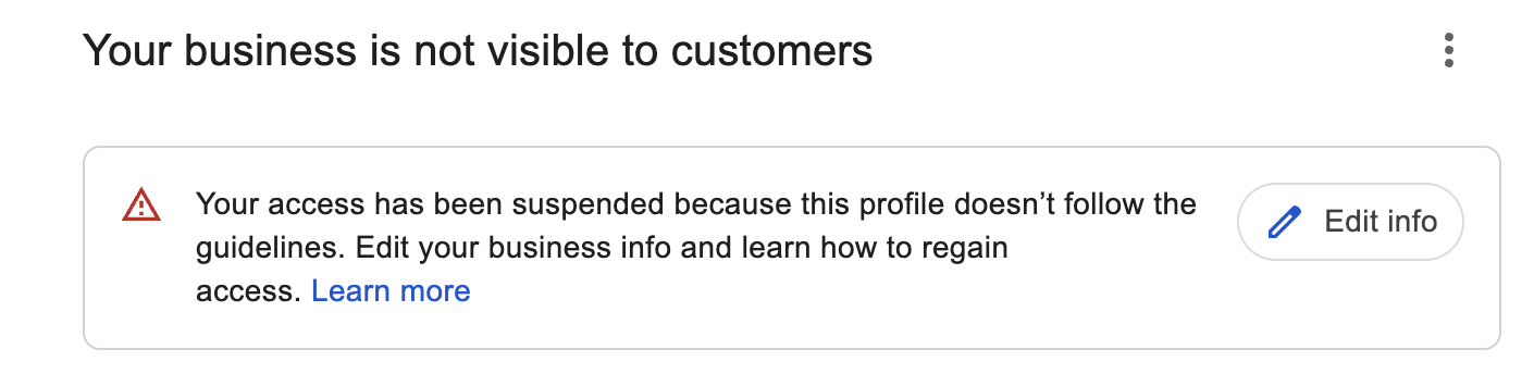 Screenshot of a Google Business Profile suspension notice reading your business is not visible to customers because the profile doesn't follow the guidelines